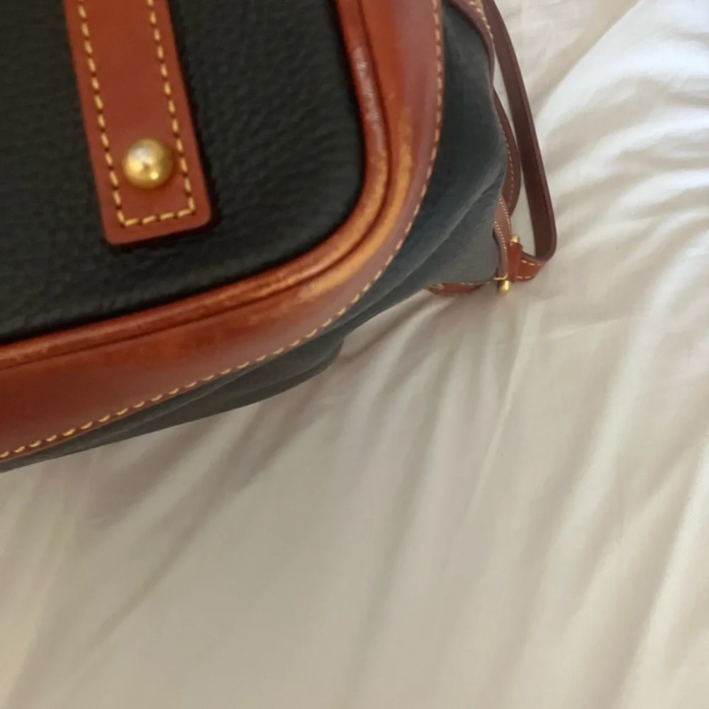 Dooney & Bourke Black and Brown Bucket Bag with Timeless Elegance - Picture 6 of 11